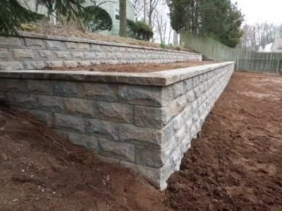 Retaining wall and landscape integration by Actaeon